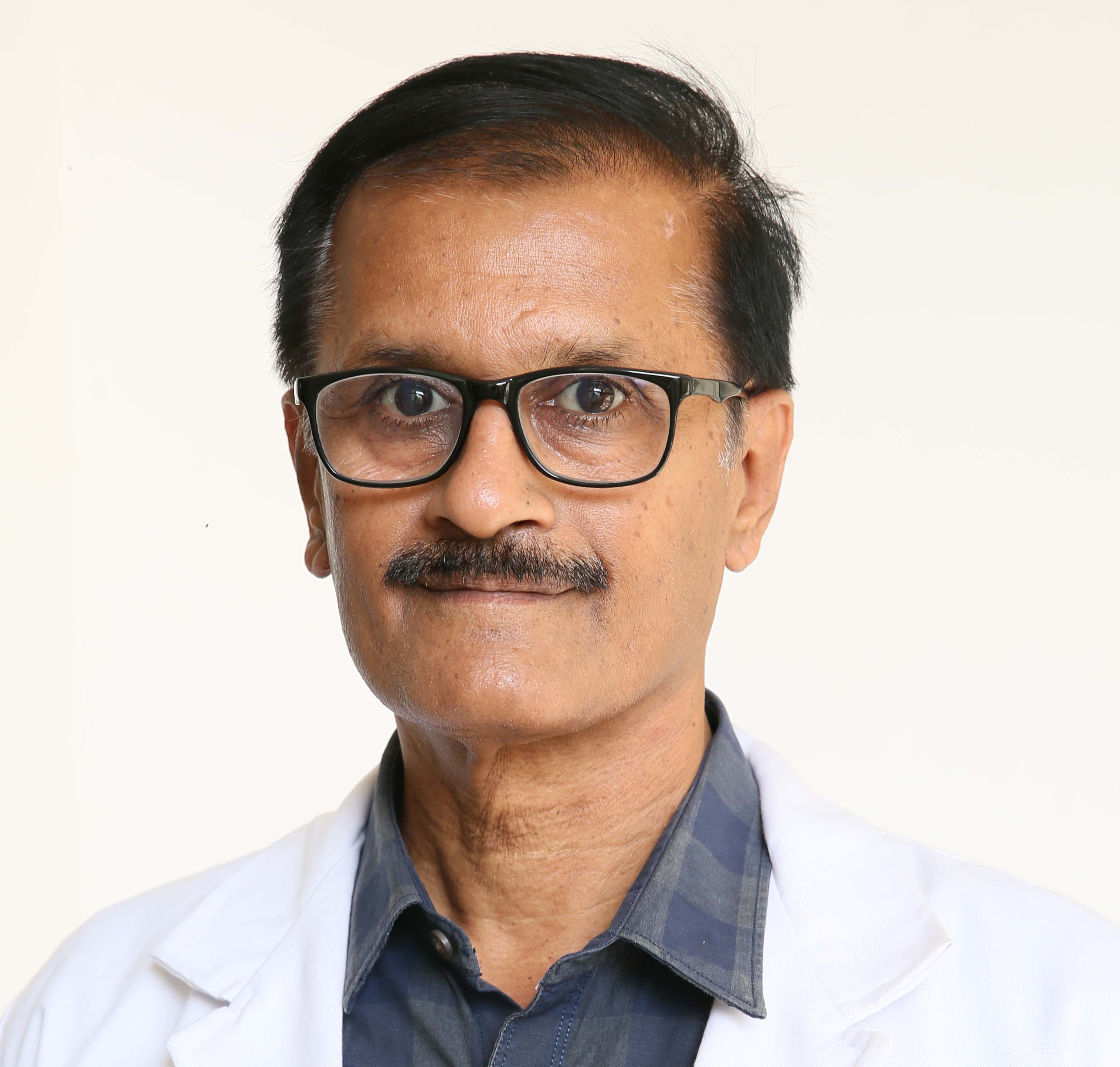 Dr. Suresh T